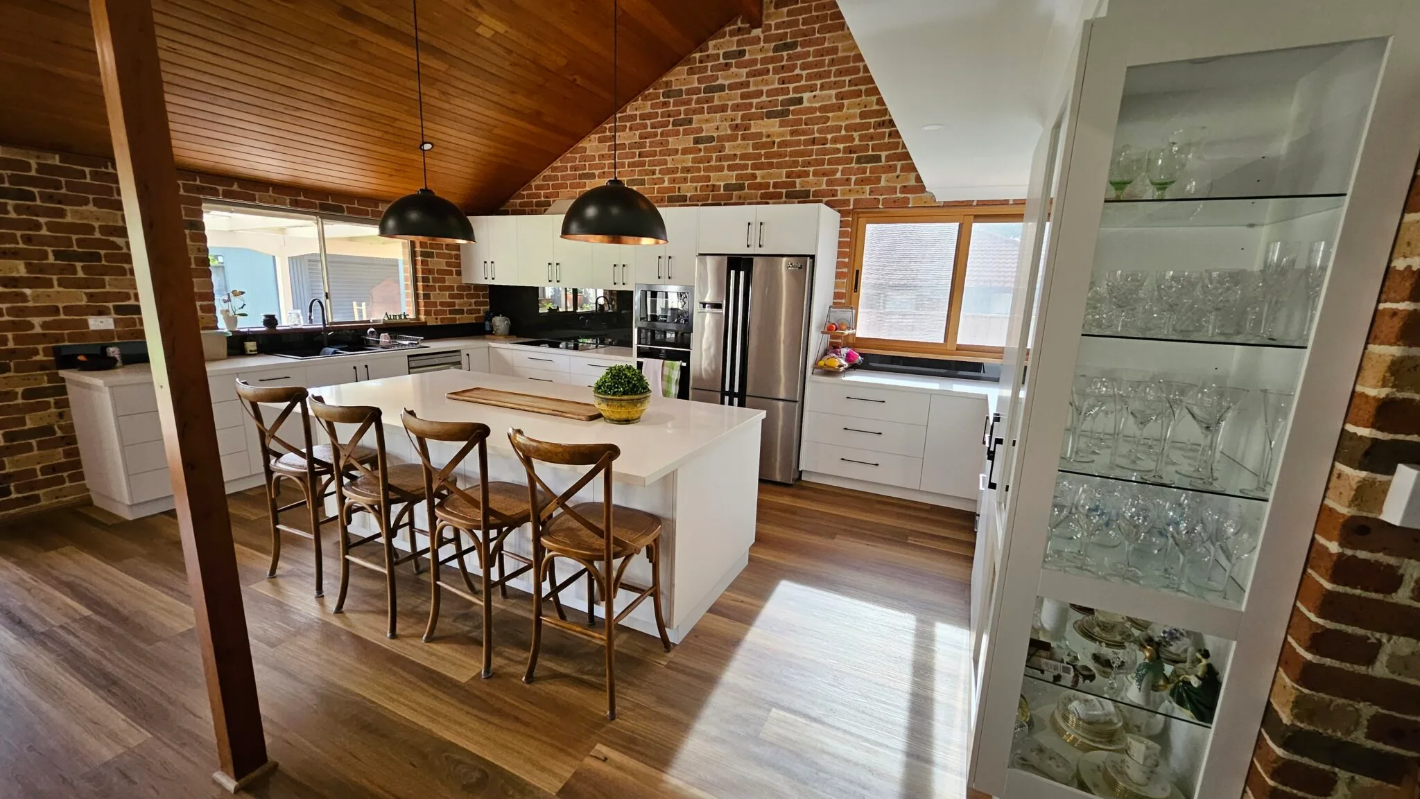 Arcwood renovated kitchen with timber detailing and connected dining space
